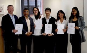 Category winners of the 2024 International Business Plan Competition at ANU, with Dr Benjamin Kus and Dr Ashis Dey in attendance at the award ceremony.